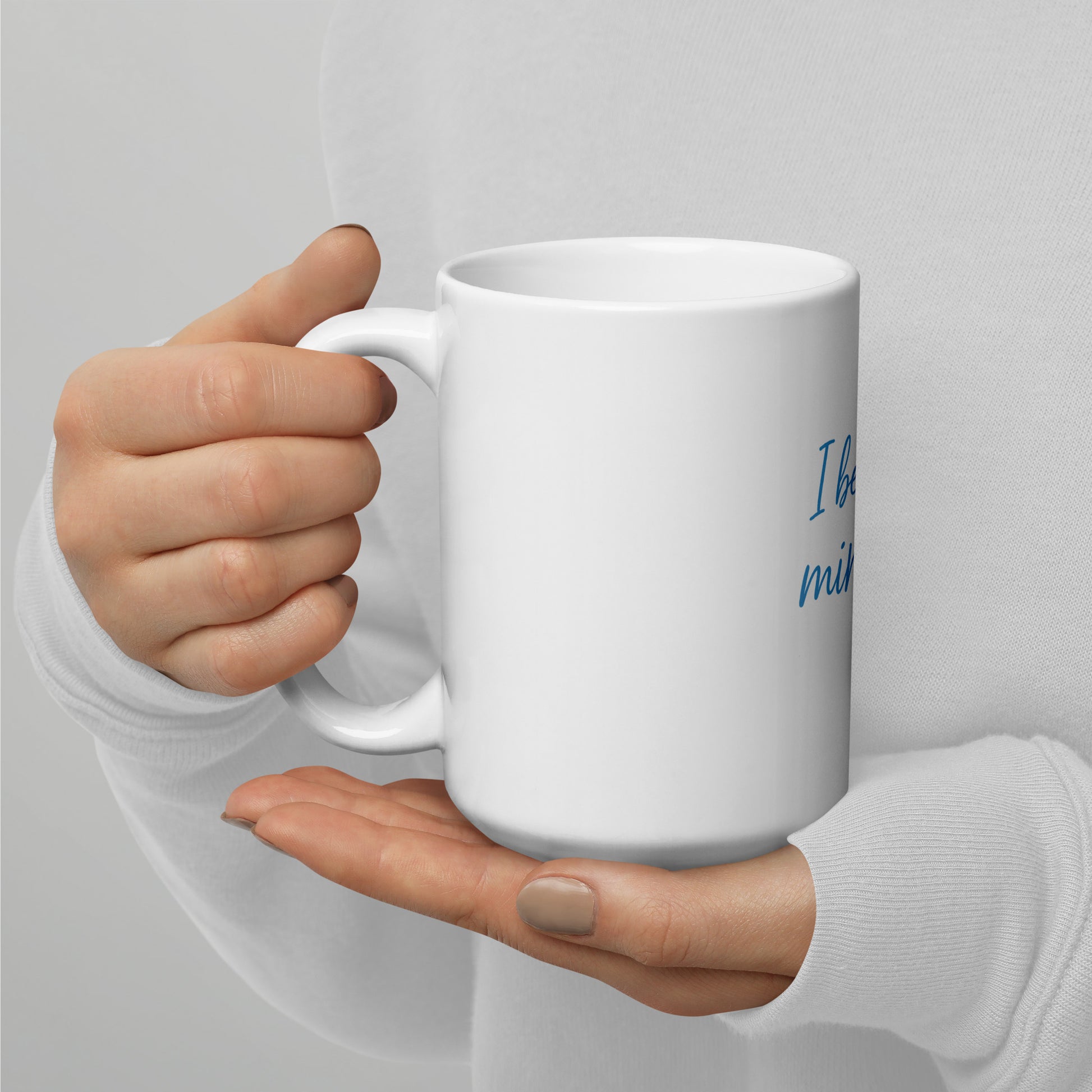 I Believe In Miracles White glossy mug