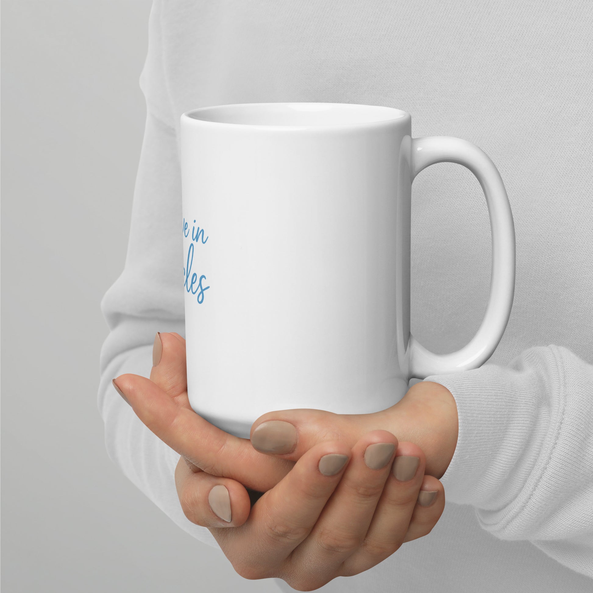 I Believe In Miracles White glossy mug